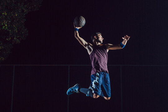 Basketball Player Jumping To Shot