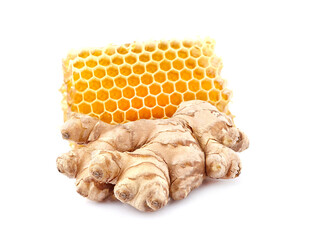 Honeycomb with  ginger  on white background closeup. Honey with spice.