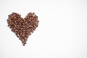 Coffee beans heart isolated on white background. Coffee beans in shape of heart