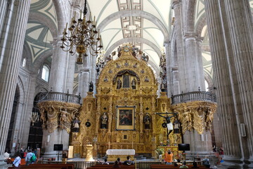 Fototapeta na wymiar Mexico City - Metropolitan Cathedral interior golden altar