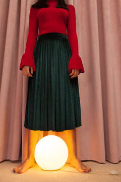 stylish woman with lamp