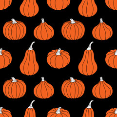 Orange pumpkins on a black background. Seamless vector pattern. Autumn illustrations for holiday decorations, postcards, banners, gift wrapping paper, modern prints, bright fabrics, and textiles.