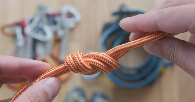 Details of a figure-eight loop, a type of knot created by a loop on the bight of rope, known as figure-eight on a bight, figure-eight follow-through, Flemish loop, or Flemish eight. Climbing, caving.