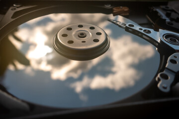 Fototapeta na wymiar internal moving parts and electronics of a typical disc hard drive