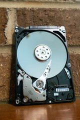 Fototapeta na wymiar internal moving parts and electronics of a typical disc hard drive