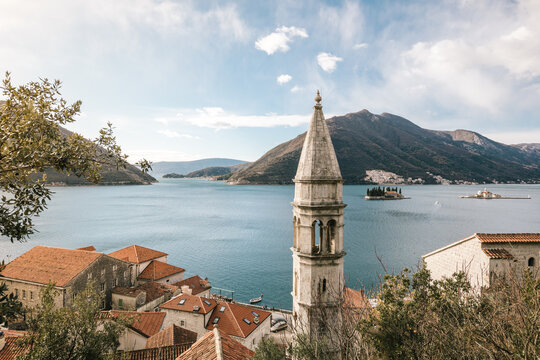 small mediteranean town with big clocktower in the bay of kotor, perast, montenegro