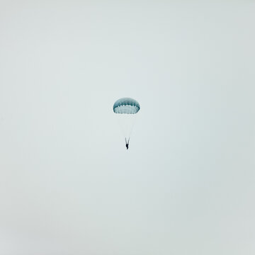 Parachutist (skydiver) flying in the sky