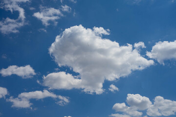 Fototapeta na wymiar white clouds on a blue sky background