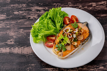 Spicy fried salmon salad