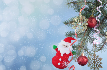 Christmas background with fir branch, christmas balls and santa