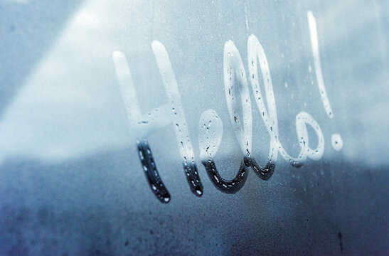 Hello written on a glass