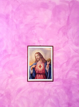 Jesus on a pink wall
