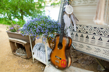 Summer cafe in a green park. Themed hipster cafe in the city park. Decor items