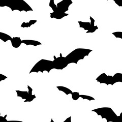 Seamless pattern with flying bats silhouettes. Halloween design on white background.