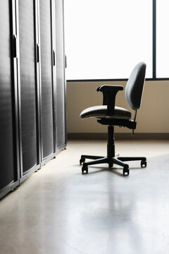 Empty chair in server room
