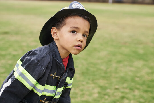Young kid playing fireman