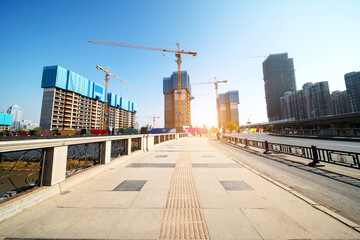 Lots of tower Construction site with cranes and building with blue sky background