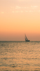 Fototapeta na wymiar sailboat at sunset