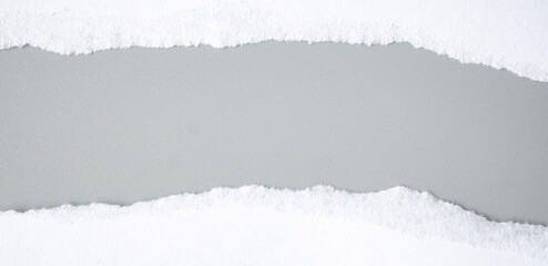 white torn paper on gray background. collection paper rip