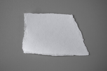 white torn paper on gray background. collection paper rip