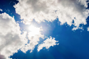 Blue sky background with a tiny clouds
