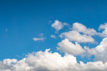 Fototapeta na wymiar Blue sky background with a tiny clouds