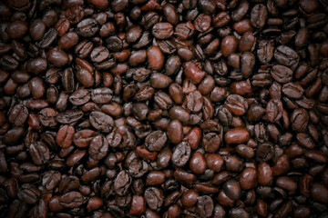 Roasted coffee beans background, Dark roast coffee beans background, top view. 