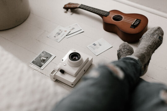 artist's tools arranged on floor in bright room