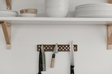 knives on magnetic board on wall