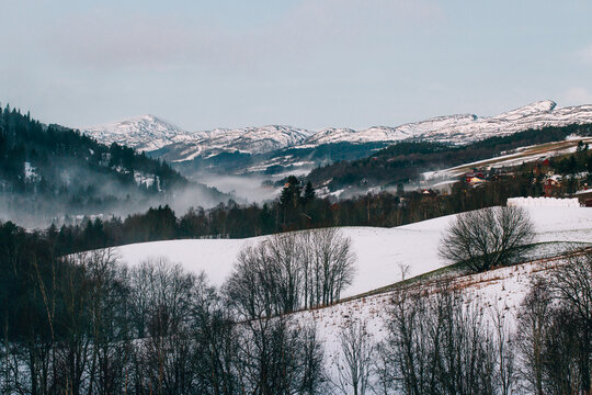 Winter Landscape - Early Morning Shot of Foggy Norwegian Valley