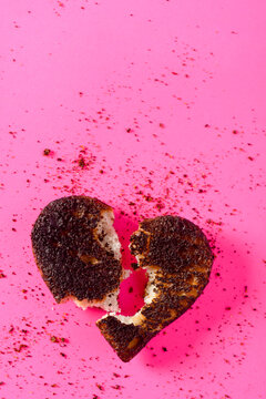 Burnt Heart Shaped Toast Torn Apart