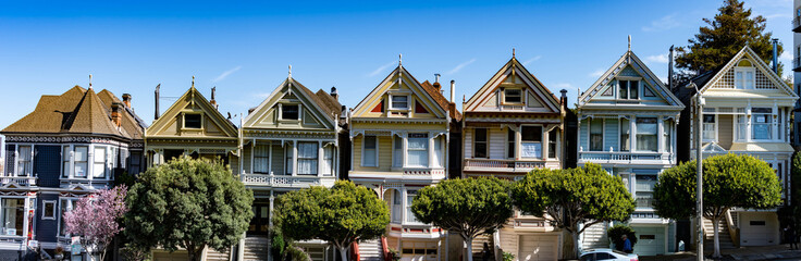 The Painted Ladies of San Francisco, California, USA. View from Alamo Square at twilight, San...