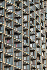 Windows pattern of Kazakhstan hotel in Almaty. Soviet modernism