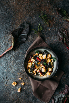 Orecchiette with rainbow chard, walnuts and thyme