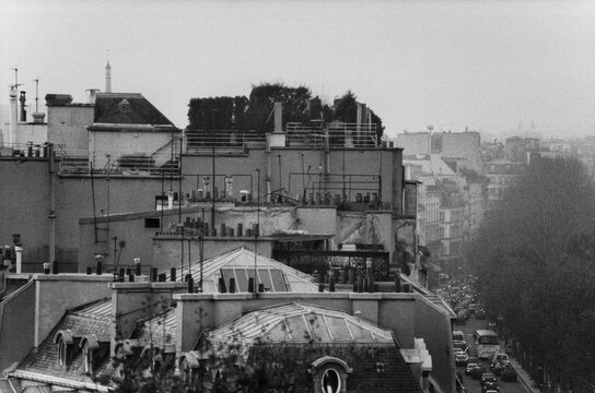 Black and White Shot of Paris Rooftops and Busy Street