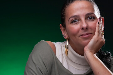 beautiful woman with hand on face, studio light, neutral background