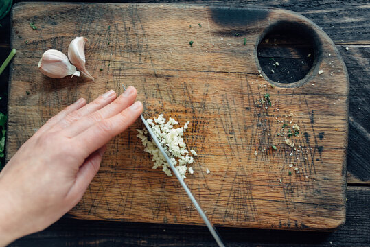 Chopping garlic from above