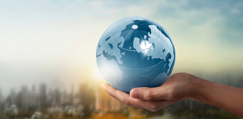 Globe ,earth in human hand, holding our planet glowing. Earth image by Nasa