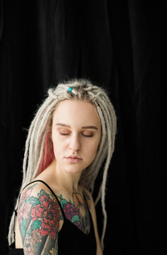 dreadlocked young woman dreaming