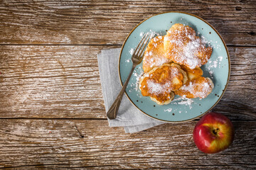 Homemade pancakes on a wooden table.