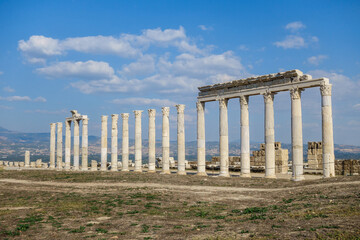Street colonnade with remains of pylons in Laodicea, ancient city near Denizli, Turkey. It was part of street with monumental gateway. City is included in UNESCO World Heritage Temtative List