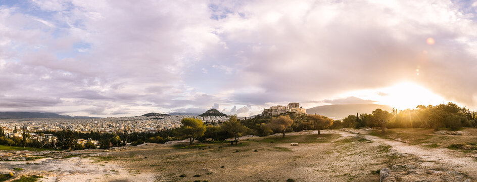 panoramashot of athen and the acropolis at sunrise