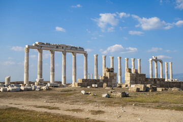 Street colonnade near agora in ancient city Laodicea, Denizli, Turkey. There are columns, pylons & remains of building's wall. City is included in UNESCO Tentative List