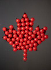 pills filling maple leaf as in Canadian flag