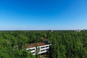 Fototapeta na wymiar Abandoned buildings of ghost town Pripyat Chornobyl Zone