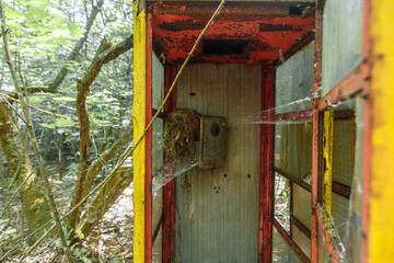 Abandoned phonebox in ghost town Pripyat Chornobyl Zone