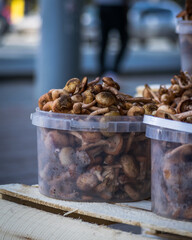 Fresh mushrooms in a plastic container