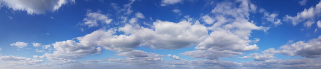 Fototapeta na wymiar Blue sky clouds panoramic background. Beautiful sky with white clouds