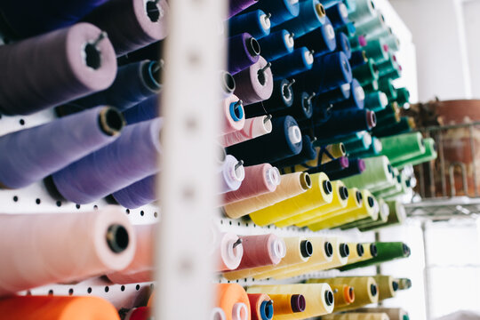 row of colorful thread
