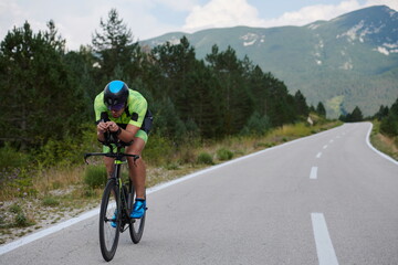 Fototapeta na wymiar triathlon athlete riding bike